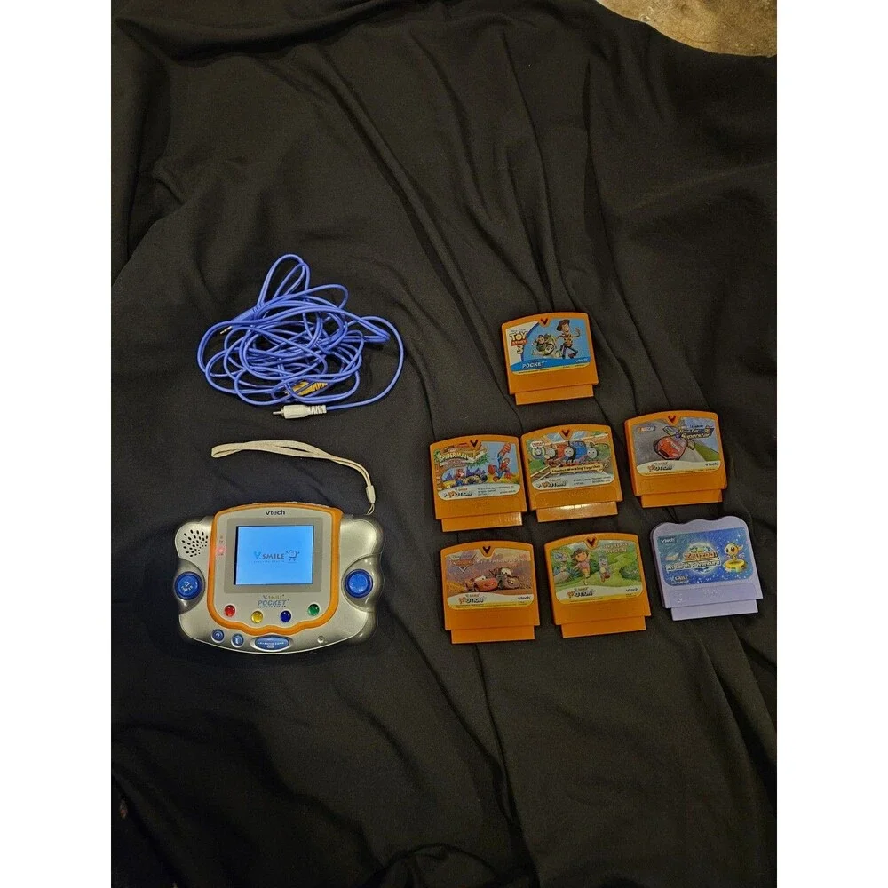 VTech V.Smile Pocket Learning System with 7 Game Cartridges Tested Works As Is